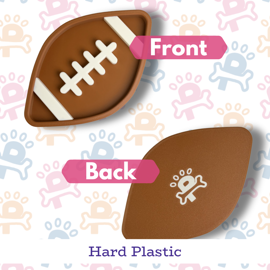 Hard plastic football-shaped object with front and back labels on a patterned background