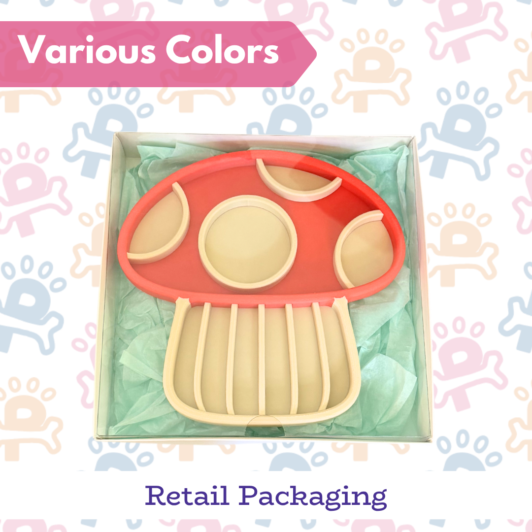 Mushroom-shaped cookie cutter in packaging with 'Various Colors' text on a colorful background.